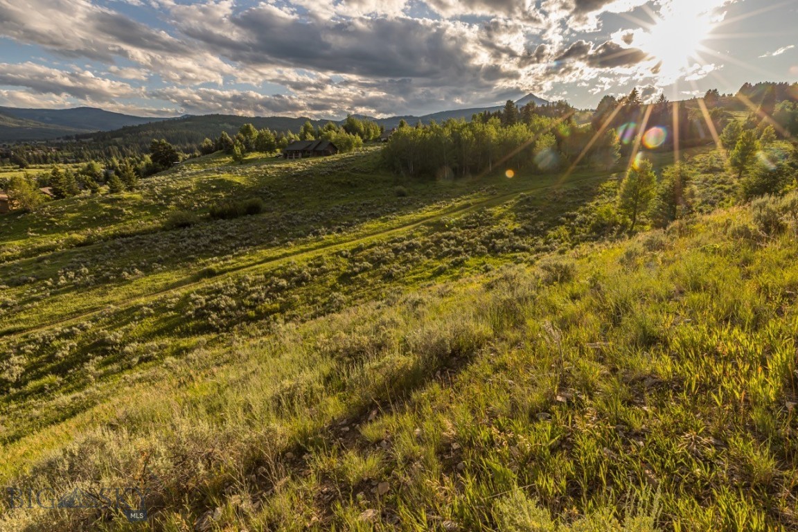 Build Your Vision in the Heart of Big Sky. An exceptional opportunity to create your mountain retreat in one of Big Sky’s most established neighborhoods. Nestled in the scenic the Big Sky Meadow Village, this stunning homesite offers commanding mountain views and seamless access to the area’s premier amenities and outdoor recreation.
From this beautiful homesite, you're just a short walk from expansive hiking and biking trails, the Big Sky Resort Golf Course, and the growing Meadow Village and Town Center—home to shops, restaurants, markets, and year-round community events. Whether you’re envisioning a peaceful getaway or an active, four-season basecamp, this property offers both flexibility and inspiration to bring your dream home to life.
Adventure continues just minutes away with world-class skiing and snowboarding at Big Sky Resort, Nordic trails at Lone Mountain Ranch, and blue-ribbon fly fishing on the Gallatin River. Within an hour’s drive, enjoy the cultural offerings of downtown Bozeman or explore the legendary beauty of Yellowstone National Park.
With its unbeatable location, opportunity for panoramic views, and access to all that Big Sky has to offer, Little Coyote Lot 30 presents a rare opportunity to build a custom residence in a setting that truly embodies the best of mountain living.