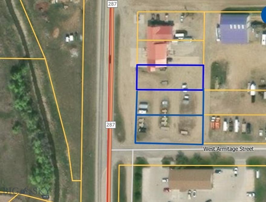 Location, Location, Location! This commercial property is comprised of 6 lots with direct HWY 287 frontage and next to the Ennis post office.  High traffic count and great exposure for your new venture!  City water and sewer services and electricity are directly behind the property in the alley.  Zoned commercial/industrial and the seller has a conditional use permit allowing mixed use- first level commercial with second level residential, offering potential for live/work units.  Easy access off HWY 287 and Armitage street and alley access to the rear. Seller is a licensed real estate agent in MT.