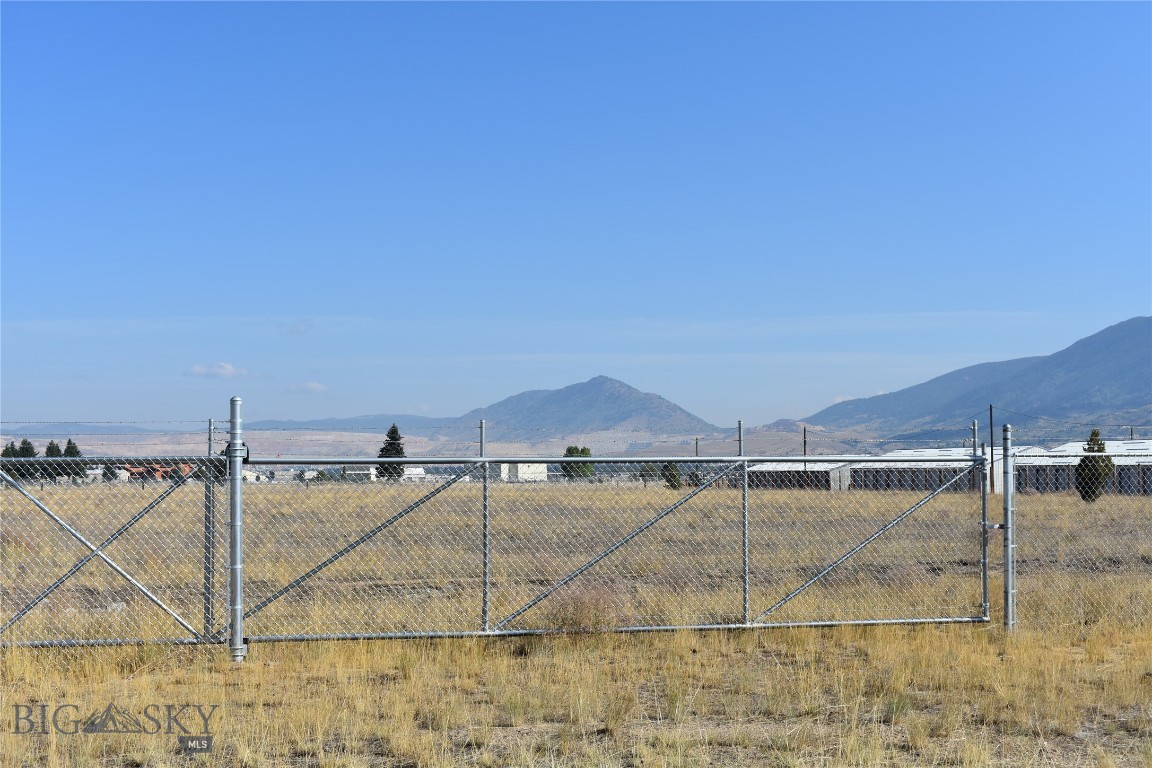 A Commercial Lot that already has fencing in an up-and-coming area. This lot is zoned C-2 and is ready for a new owner looking to break ground on a new exciting project...