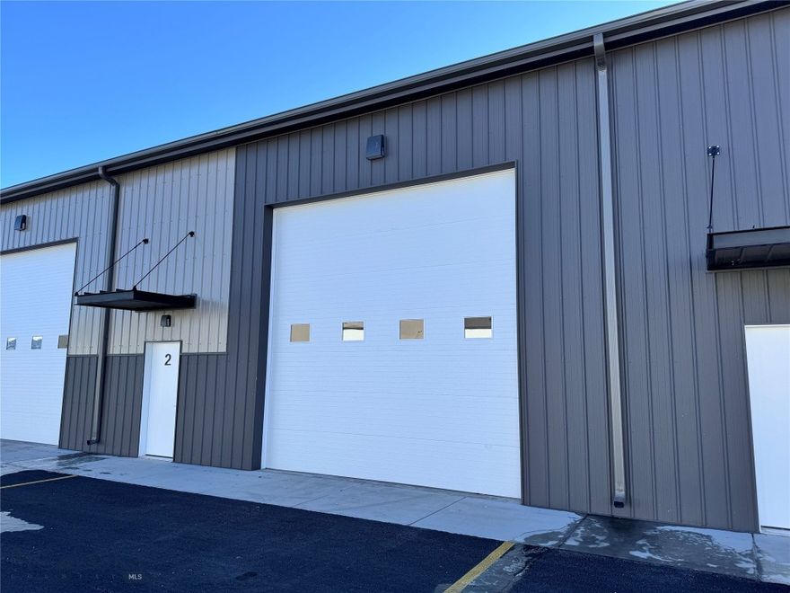 Strategically located commercial warehouse in North Belgrade, just a stone's throw away from the Bozeman Yellowstone International Airport and a direct route to Big Sky. Minutes from the interstate, this property is an ideal choice for businesses and investors targeting the expanding market in the Bozeman area. The warehouse boasts a modern, insulated, and heated metal structure, complete with 18-foot ceilings and a large 14'x14' garage door, making it perfect for a variety of commercial uses. From trade businesses to retail operations or even for storing large vehicles and recreational equipment, the versatility of this space meets diverse needs. Designed for low maintenance and high efficiency, this commercial condo offers convenience and practicality. It represents a prime investment opportunity in the fast-growing Belgrade sector, serving as a crucial hub for those needing expansive warehouse space near Bozeman. SELLER FINANCING AVAILABLE! 4.5% INTEREST FOR 5 YEARS WITH 25% DOWN (subject to credit approval) Creative financing and rent to own options are available to facilitate ownership in this desirable Bozeman commercial real estate market.