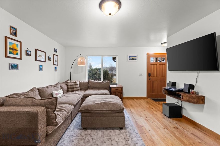 Well-positioned in the Valley West subdivision, 481 N Ferguson #C offers an increasingly rare opportunity to own in one of Bozeman’s most popular neighborhoods. This 2 bedroom, 1.5 bathroom condo features a functional layout tailored for everyday living. Hardwood flooring throughout the main level adds warmth and durability, while the kitchen’s granite countertops are both stylish and built to last. A convenient half bath on the main floor enhances ease of living and entertaining. Upstairs, two comfortable bedrooms provide flexibility for a home office, guest space, or roommate potential. The washer and dryer are thoughtfully located on the upper level and stay with the property. Additional highlights include a one-car garage, dedicated parking directly in front, and a private fenced area ideal for relaxing outside or taking out pets. With close proximity to parks, trails, and everyday amenities, this condo offers an ideal blend of convenience, livability, and long-term value in the Bozeman market.