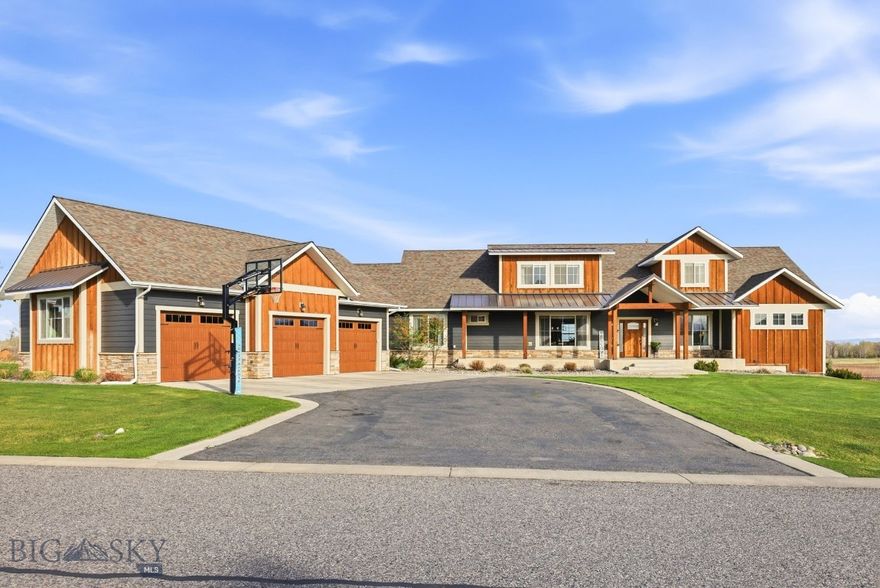 Discover an exceptional 6-bedroom, 5.5-bathroom luxury home offering over 6,800 square feet of thoughtfully designed living space, perfectly positioned to take in truly stunning, unobstructed views.

Located in the highly sought-after Middle Creek Parklands subdivision, this home also offers the convenience of a short walk to Monforton School, making it an ideal setting for both lifestyle and location.

The main level welcomes you with a bright, open-concept floor plan designed for effortless entertaining, seamlessly connecting expansive living and dining spaces with a beautifully appointed kitchen. With two full kitchens and multiple living areas, the home is perfectly suited for hosting gatherings, accommodating guests, or multi-generational living.

Four of the six bedrooms are private en-suites, providing comfort and privacy for family and visitors alike.

The walkout basement offers incredible additional living space, featuring a second full kitchen, a spacious living room, a dedicated theater room, two bedrooms, a full bathroom, a laundry room, and a private office. A massive exercise and game room completes the lower level, creating the ultimate space for recreation and relaxation.

Step outside and unwind on the back patio, where you can soak in the hot tub while taking in the breathtaking views—your own private retreat at the end of the day.

Additional highlights include a three-car heated garage, ensuring year-round convenience.

With room for everyone and every activity, this remarkable property combines luxury, functionality, and an unbeatable location—truly offering everything you could want and more.