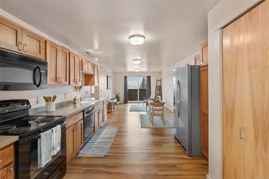 Clean, cute, and perfectly located, this 2 bedroom, 1.5 bathroom Bozeman condo offers easy living. Whether you’re looking for a comfortable home base between adventures or a low maintenance spot near work or campus, this one checks all the boxes.

The bright, open layout brings together the kitchen, dining, and living areas, featuring wood cabinets and plenty of storage, along with a convenient half bath for guests. Two bedrooms are thoughtfully located near the full bathroom, creating comfortable and functional spaces. A large laundry room provides additional space for storage and everyday convenience.

Step out onto the balcony overlooking open space. Just minutes from shopping, restaurants, trails, and all that Bozeman has to offer, this is a true lock and leave option with a welcoming, move in ready feel, plus a designated carport for easy parking.