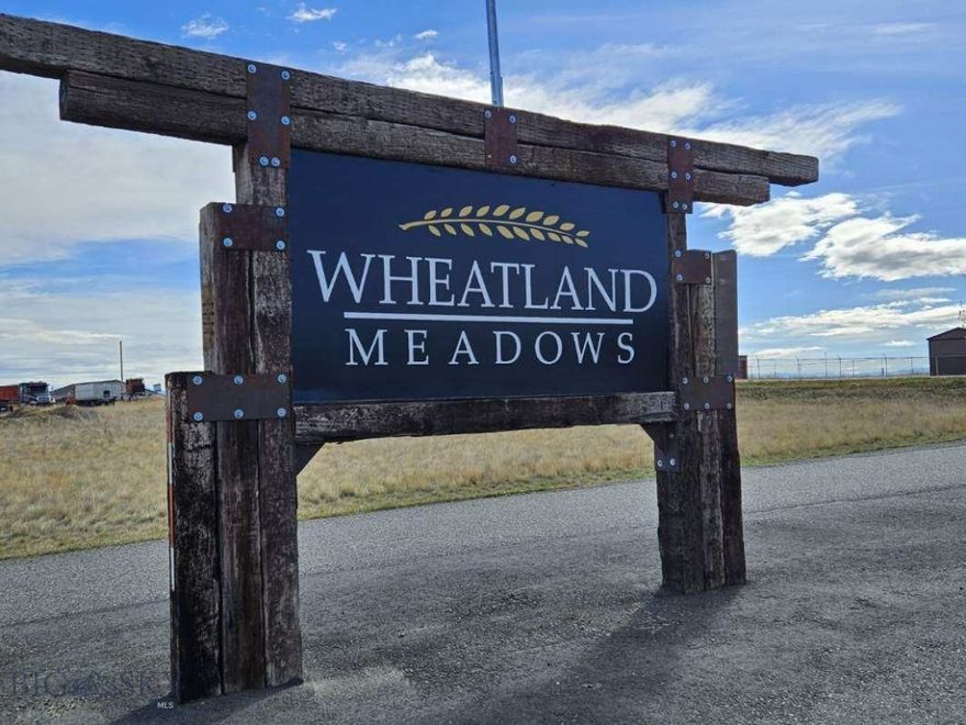 Settle into the peaceful, scenic beauty 2.6-acre parcel in the highly sought-after Wheatland Meadows subdivision. Perfectly suited for your custom dream home, this lot offers panoramic, unobstructed views of the Spanish Peaks, Bridger Mountains, Gallatin Range, and Horseshoe Hills—ideal for those seeking tranquility and natural beauty.
Conveniently located with paved roads and utilities, including power at the lot, this property offers both privacy and practicality. Septic has been engineered and approved. The covenants allow for the construction of up to two accessory buildings, including a shop, making it an excellent choice for those with hobbies, tools, or outdoor toys.
