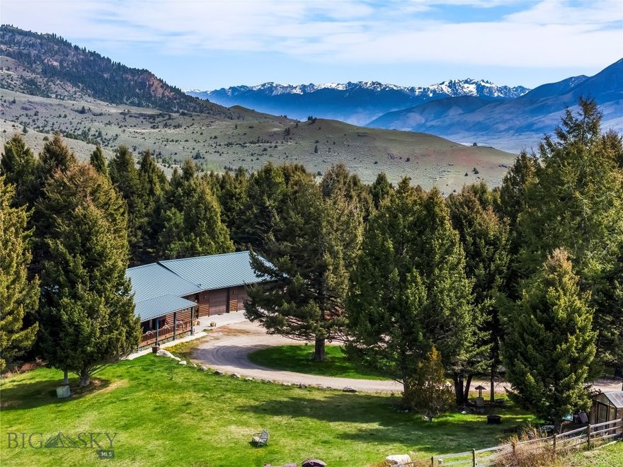 Would you like to escape to your own private Montana retreat where mountain serenity meets year-round adventure? Nestled on 20 breathtaking acres of aspens, pine trees, and open meadows, this exceptional property offers unmatched privacy, stunning sunset views of the Gallatin Divide, and quick access to some of the West's finest outdoor recreation.
Just 25 minutes from Gardiner, the iconic northern entrance to Yellowstone National Park, and only 45 minutes to Livingston, this property delivers the perfect balance of seclusion and convenience. A nearby Forest Service trailhead opens access to thousands of acres of public land, offering endless opportunities for hiking, horseback riding, hunting, fishing, and wildlife viewing. Ride your horse directly to Forest Service land across the road or venture five miles to the Rock Creek Trailhead within the Gallatin National Forest.
Wildlife is abundant here. Deer, elk, the occasional moose, and a plethora of bird species regularly visit the property. Just a short hike away, Rock Creek offers a fishing option adding to the peaceful, retreat-like atmosphere. The Yellowstone River is only 12 minutes away, and Highway 89 is an easy 15-minute drive.
The property is fenced and horse-ready, making it ideal for equestrian enthusiasts or anyone seeking a true Montana ranch lifestyle. 
The well-maintained 2,688 sq. ft. home built in 1998 features 3 bedrooms and 2 bathrooms with warm, comfortable living spaces designed for all seasons. Enjoy radiant in-floor heat from the gas hot water boiler system as well as a cozy gas stove in the great room. A large covered wraparound porch overlooks the beautifully irrigated lawn and captures unforgettable western sunsets.
Also included is an impressive 1,768 sq. ft. heated 3-car garage/shop complete with its own bathroom, perfect for equipment, toys, projects, or additional workspace.
Whether you’re looking for a full-time residence, recreational basecamp, horse property, or private mountain getaway, this extraordinary property embodies the very best of Montana living.