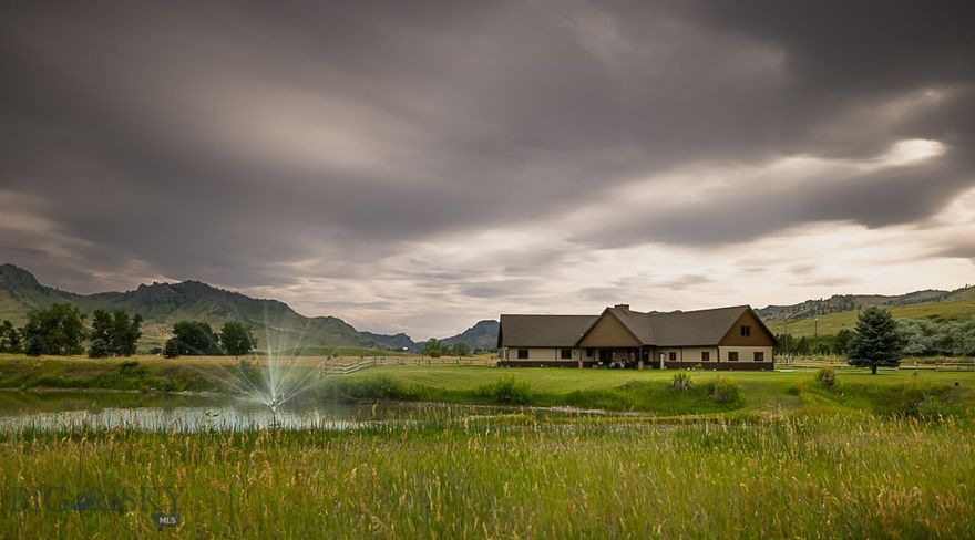 Stunning Montana Retreat with Blue Ribbon Trout Fishing on the Missouri River! Welcome to your dream home nestled on 4.11 pristine acres with breathtaking mountain views, lush, irrigated lawn, and direct access to world-class Blue Ribbon trout fishing on the Missouri River and 20 RV hookups. This property offers the perfect blend of luxury, serenity, and outdoor adventure. Step inside to discover 3,379 square feet of open-concept living space, thoughtfully designed to maximize natural light and panoramic views. The spacious floor plan features high ceilings, expansive windows, and seamless flow between living, dining, and kitchen areas—ideal for entertaining or simply relaxing in comfort. Central air conditioning ensures year-round comfort. Step outside to your private outdoor oasis, where two serene ponds and a manicured lawn create a peaceful setting for gatherings, wildlife watching, or quiet evenings under the stars. Whether you’re casting a line in the Missouri River, enjoying the mountain views, or relaxing beside the ponds, this property invites you to experience Montana living at its finest. Don’t miss this rare opportunity to own a one-of-a-kind property that combines luxury, lifestyle, and natural beauty. Schedule your private showing​​‌​​​​‌​‌​​​​‌​​‌​​​​‌‌ today.