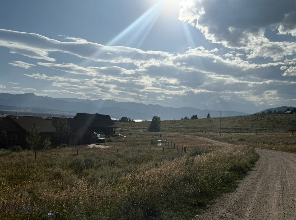 Beautiful 1-acre parcel located in the Aspen Hills subdivision, just 15 minutes north of West Yellowstone and the west entrance to Yellowstone National Park. This elevated lot offers scenic views of Hebgen Lake and the surrounding mountains, making it an ideal location for building a future home or vacation retreat.
Enjoy year-round access and recreation with close proximity (approx. 6 miles) to a Hebgen Lake boat ramp. The area is perfect for outdoor enthusiasts—offering fishing, boating, hiking, skiing, snowmobiling, and easy access to Yellowstone’s stunning natural beauty. With privacy, convenience, and endless recreation in every direction, this lot offers a rare opportunity to enjoy the best of Montana living in a top-rated destination.