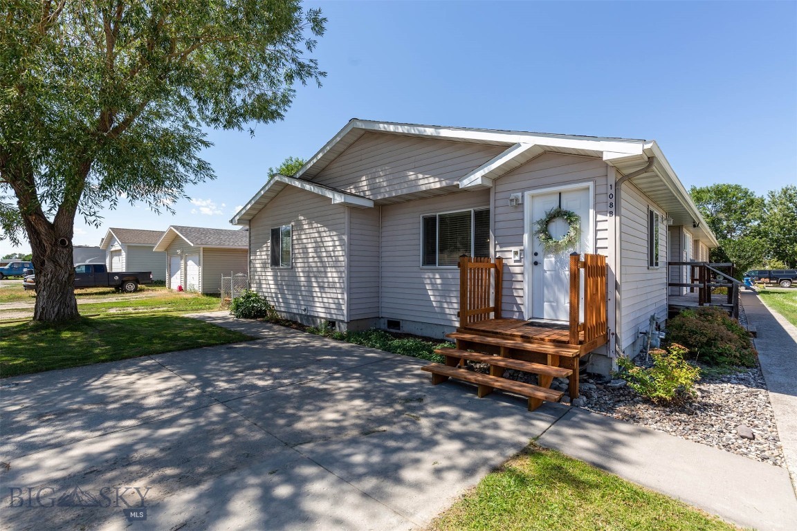 THE BETTER OPTION if you are looking for value but don't want to sacrifice space, floorplan and updates. If you have been renting or considering condos, here is your opportunity! Welcome to this beautifully updated townhome, offering affordable comfort in Belgrade. Gain the tax benefits of home ownership, own the land under your home, avoid costly and poorly managed condo associations AND enjoy the benefit of the Seller's hard work! This 1,389 sq. ft. home is all on one level, making it both accessible and convenient. The heart of the home features an open concept living area that seamlessly connects to the spacious kitchen and dining area. The kitchen boasts ample storage and counter space, making meal prep a breeze. Newly planted wildflowers lining the front entry of the home are welcoming, while the fenced side yard is perfect for pets. This townhome also includes multiple updates, ensuring a move-in-ready experience with new luxury vinyl plank flooring, all new paint, improved floor plan, 2 new decks, new water heater and roof in 2024, and updated bathrooms. Whether you’re looking for your first home, downsizing, or seeking a low-maintenance lifestyle, this property checks all the boxes. Located just minutes away from shopping, parks, and schools, I-90, Big Sky and Bozeman.