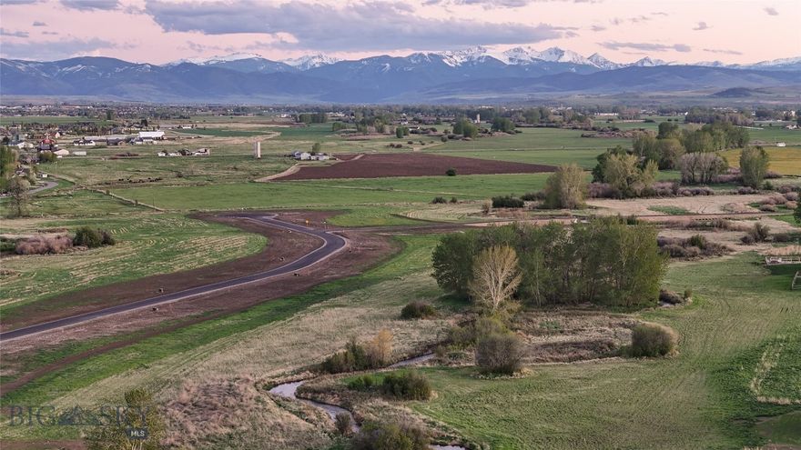 Just under an acre lot in the stunning Riverwood Subdivision! Nestled between Bozeman & Belgrade with a Bozeman address, this subdivision
offers a rural feel while being close to all of the area amenities. Boasting a variety of views: mountains, farmland, rural, and even a creek running
through the property. This is a great opportunity for those seeking elbow room and privacy while also being minutes away from town. Get going on
your dream home today!