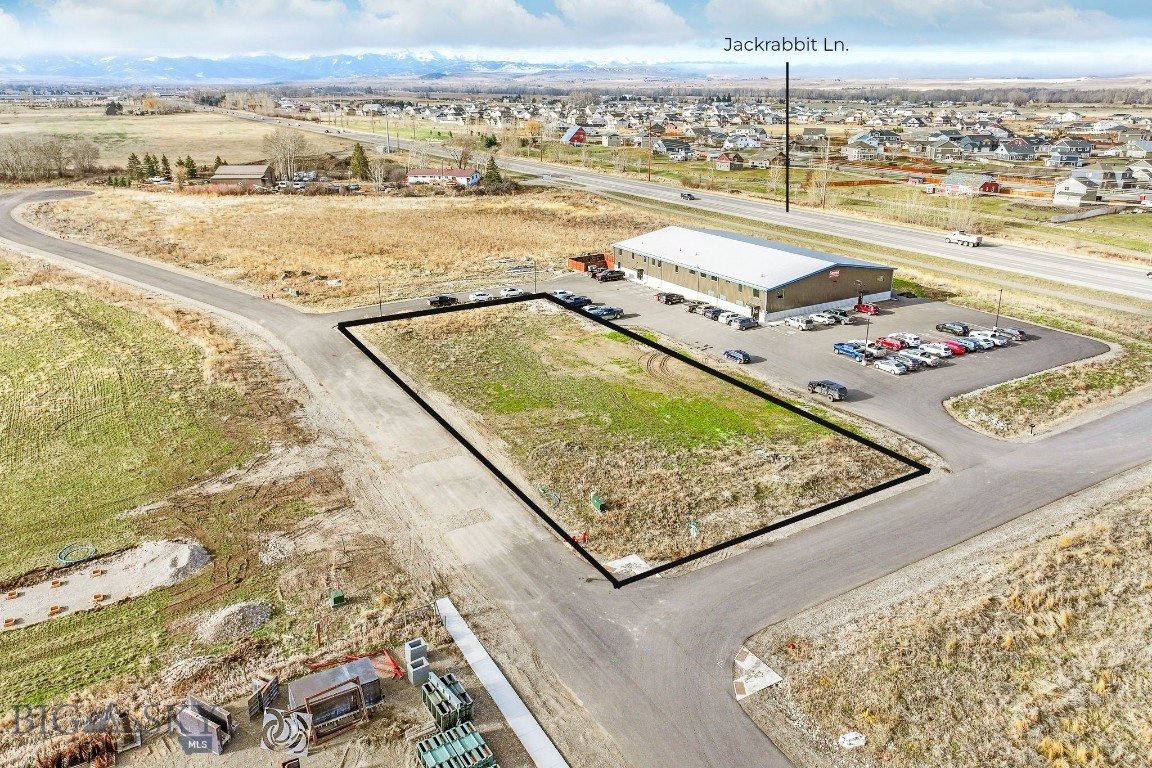 Highly Visible Corner Lot Available for Lease! Just over half an acre of prime land is available for lease in a high-traffic location just off Jackrabbit Ln between Belgrade and Four Corners. This corner lot boasts incredible visibility with a daily traffic count exceeding 18,200 vehicles on Jackrabit, making it perfect for a wide range of businesses. Long-term lease available. Don't miss out on this exceptional opportunity! Contact us today to schedule a showing.