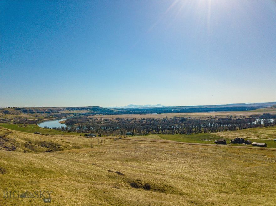 Experience the epitome of Montana living with this hard-to-find, large building site near Great Falls, boasting incredible vistas overlooking the majestic Missouri River. Immerse yourself in the breathtaking beauty as geese migrate against a backdrop of distant snow-covered mountain peaks. Listen to pheasants cackle and watch rutting whitetail from your perch above the river bottom.  This coveted area offers protective covenants ensuring the preservation of your land and home value for years to come.

Conveniently located about 15 minutes from the airport and 20-25 minutes from downtown, this parcel offers unmatched convenience with country charm. Explore the potential for a partial split (with HOA and/or county approval) maximizing returns for the new owner. With two recorded easements and an unrivaled viewscape this is a special property.

For those seeking river access, two options are available within a few miles, including a shared access site for the HOA.