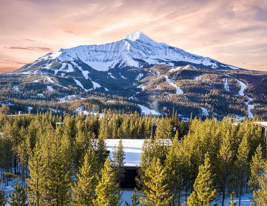 One&Only Private Home #61 offers a thoughtfully scaled mountain retreat designed to immerse residents in the beauty of Moonlight Basin. Created by Olson Kundig, the home reflects a refined architectural approach that prioritizes light, views, and connection to nature.

Spanning approximately 4,020 square feet, this five-bedroom residence features open living spaces framed by expansive glass, allowing mountain views and natural light to define the interiors. Clean lines, warm finishes, and inviting fireplaces create a welcoming yet elevated atmosphere.

Designed for both entertaining and quiet retreat, the home’s interior spaces extend seamlessly to outdoor terraces ideal for enjoying Montana’s changing seasons. Whether hosting guests or savoring moments of solitude, this residence offers an exceptional mountain living experience.

Located within One&Only Moonlight Basin, Private Home #61 provides access to world-class amenities, curated adventures, and the signature service that defines the One&Only lifestyle.
