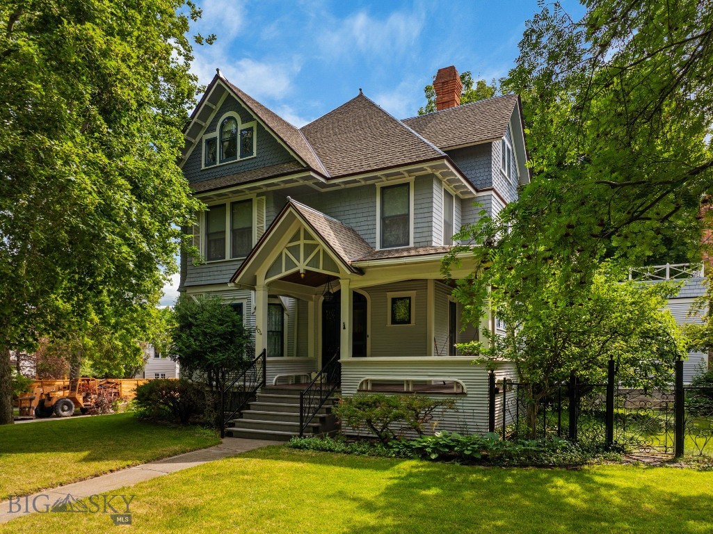 Welcome home to 604 S Willson. This Historic Preservation Award of Excellence winning, well-maintained 1904, 4 bedroom, 3 1/2 bath, 4,556 sq ft home with 2-car carriage house w/ roughed in 732 sq ft bonus space above has not been on the public market for over 80+ years. This stately, architecturally designed Queen Anne Craftsman home is nestled on a corner knoll in Bozeman’s charming, historic S Willson Aveneighborhood, 5 blocks from Bozeman’s downtown, Main St, moments from the MSU campus, the Sourdough/Gallagator Linear Trail system, recreation, & all things Bozeman. Having not exchanged ownership in 50+ years, this turn of the century residence features 3 stories in addition to a basement level, an oasis of a backyard, mature landscaping, English gardens, & historic custom designed hand-wrought iron hand rails, gates, & fencing. The property's 2-stall carriage house, boasts workshop space up front, an I-beam installed w/ a chain hoist for heavy lifting, 220v electrical, storage for outdoor gear, side off-street parking, & alley access in the back. The carriage house's 732 sq ft upstairs bonus area is prime for additional guest quarters, home office or artist’s studio. Every inch of this property offers character & a sense of Bozeman’s history; from the welcoming wrap-around covered front porch, original hardwood finishes & floors, leaded glass, & other preserved accents. The homes spacious completely-private backyard is ideal for hosting events, entertaining, or simply relaxing & unwinding & provides a grand arboreal canopy, a large back deck & fabulous 2nd-level sun deck overlooking the private outdoor oasis. With main level kitchen, dining, & dual living areas, the home's layout flows effortlessly from room to room. The 2nd level provides a primary bedroom, 2 additional guest bedrooms, bath, large laundry area & sun deck access. The 3rd floor has a cathedral ceiling & offers addt'l space for guest bedrooms, has an ensuite bath & versatility whether utilized as cozy guest quarters, a home office, or creative space to suit other needs. The basement level has separate exterior access & an additional 1090 sq ft of storage, hobby space and/or is simply awaiting the vision of its next owner. This captivating home is locationally perfect to fully embrace Bozeman’s downtown lifestyle, shopping, dining, entertainment, & outdoor recreation. Don’t miss this once-in-a lifetime-opportunity to own this ideally located, downtown, University-centered property.