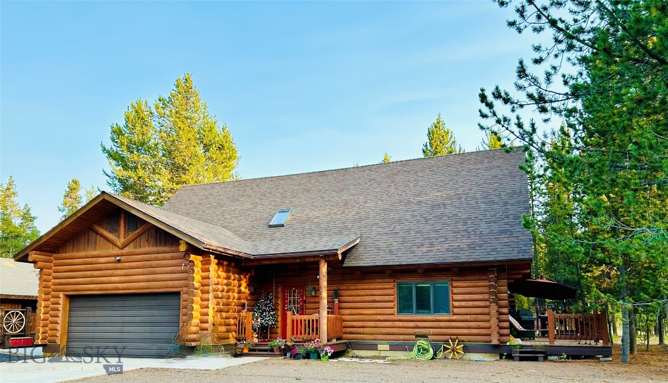 Montana Log Home in the Pines awaits you. This is a custom-built log home with tons of rustic charm throughout. This 3-bedroom, 2 full bath home has many extras that make this log home unique and ideal for anyone looking for their West Yellowstone home. An open concept main living space with just the right touches of rustic. Stunning log beams, river rock gas stove, open log stairway, upper-level loft, grand windows, granite counters and so much more bend beautifully. Living made easy with the main single level living room, dining area, kitchen, master suite, laundry room and garage access and entry. Upper-level bedrooms, loft office area, full bath, reading nook and an extra loft space that the young and young at heart will love. Ample outdoor space including a large deck with easy access from the dining room an upper-level balcony, front covered porch all are perfect for enjoying this extra-large lot in a beautiful residential neighborhood. Attached two bay garage, paved circle drive, carport and detached garage provide ample parking/storage to meet all your needs. Home is located off the main traffic areas of the subdivision, within walking distance of the school, only blocks from West Yellowstone main activities & entertainment, and Yellowstone Park west entrance. A Montana Log Home you'll be proud to own eagerly awaits. Schedule your appointment for your tour of this stunnig Log Home today.
