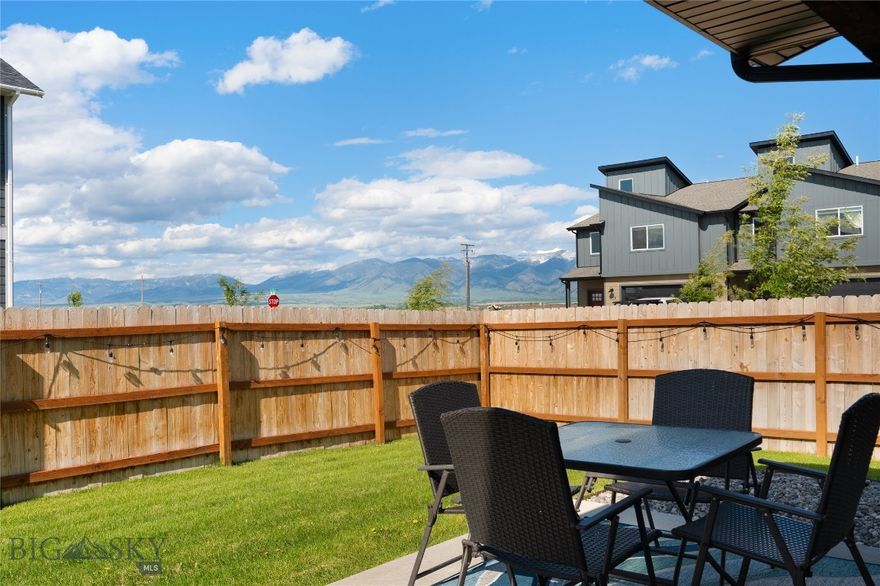 Like New, now with a $5,000 Seller Credit! Welcome to this like-new high end townhome on a spacious corner lot in Belgrade. This thoughtfully designed two-story residence offers a light and airy layout with upgraded finishes throughout—including full-height tile backsplash, modern lighting, and Bridger Mountain views from the second level. With an open-concept main floor, spacious bedrooms upstairs, AC, and a fully fenced backyard, the home balances everyday comfort with easy entertaining. Whether you’re looking for a primary residence, a lock-and-leave second home, or a low-maintenance investment, this property fits the bill. Located just minutes from the airport, downtown Belgrade, and the rapidly growing amenities along Jackrabbit Lane, this is an ideal opportunity to own a newer home in a quiet and accessible neighborhood. A must see!
