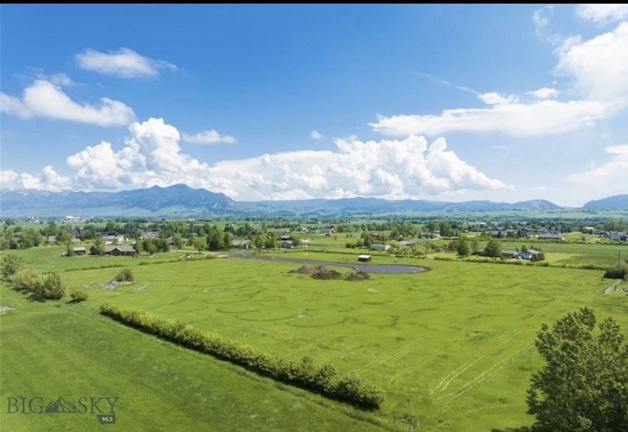 Very last lot available in small no bureaucracy subdivision.   VIEWS VIEWS VIEWS in all directions of Spanish Peaks, Bridger Mountains, and Hyalite on this flat buildable lot. Be part of a small 5 lot HOA with efficient CC&Rs and surrounded by space. Lot is zoned for 5BR / 5BA house + 2BR/2BA ADU + Work Shed/Office so 3 total structures.