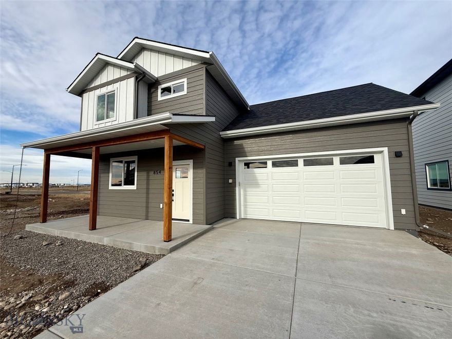 Welcome to Bridger Homes MT—crafted with exceptional attention to detail and designed for modern living. This thoughtfully planned residence offers spacious open-concept living on the main floor with 9ft ceilings, a convenient half bath, and a stunning kitchen featuring a large island, dining area, abundant cabinetry, under-cabinet lighting, and 3cm quartz countertops. Stay connected with fiber optic wiring throughout for ultra-fast internet and seamless streaming. Upstairs, enjoy a dedicated laundry room with upper and lower cabinets, four bedrooms, a full bath with a tile surround shower, and a luxurious primary suite with an ensuite bath featuring a full tile shower, and walk-in closet. The oversized, fully insulated, and painted garage includes an 8ft door, extra storage, and a side man-door for easy yard access. Don’t miss this move-in-ready home blending style, function, and convenience! Staged photos are of a similar model home.