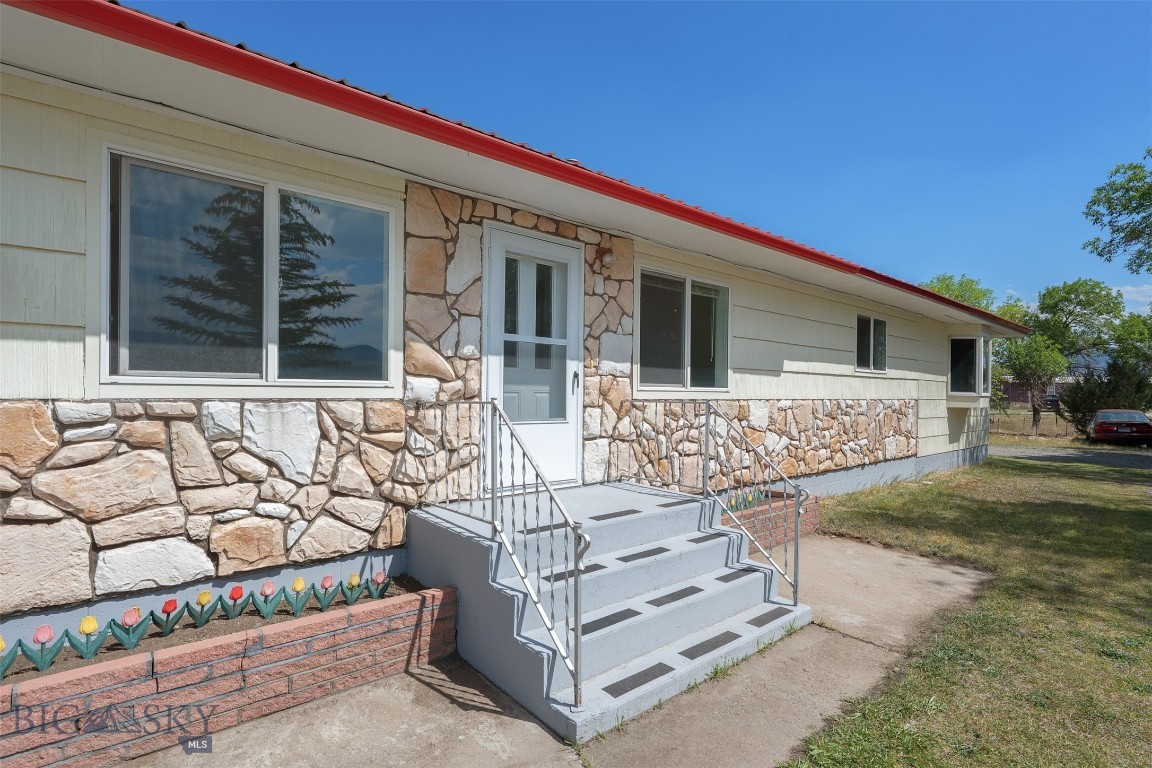 Discover the perfect blend of space, comfort, and opportunity with this unique property sitting close to Fairmont, Anaconda and Butte. Sitting on a generous 3.14-acre lot, this well-maintained home offers room to breathe and grow—with bonus income potential built right in, with 3 bedrooms, 2 full baths, bright kitchen, 4 car garages-ideal for vehicles, toys or workshop, along with 3 storage sheds for all your gear and tools, plus two separate 1-bedroom apartments—perfect for rental income, guest suites, or multi-generational living
