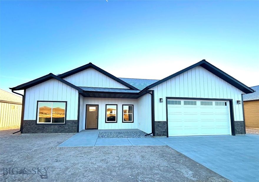 Welcome home to 130 Thomas Way, a timeless BRAND NEW BUILD that you have been looking for! This new construction home offers modern comfort, quality craftsmanship, and an exceptional setting with no neighbors out the back—providing peaceful farm field and mountain views.
The open floor plan flows seamlessly from the kitchen into the living room, featuring large windows that flood the space with natural light and showcase the surrounding scenery. Quartz countertops, rustic fixtures, and solid alder doors and trim are found throughout the home, adding warmth and character.
Behind a sliding barn door, you’ll find a private hallway with a large walk-in pantry and entrance into the bright primary suite, complete with a spacious walk-in closet and private bathroom—creating a quiet and comfortable retreat. On the opposite side of the house, you will find the two additional bedrooms and a full bathroom. Both bedrooms feature large picture windows that bring in abundant natural light, making each room feel open, airy, and generously sized.
A convenient mudroom and laundry room provide direct access from the 2-car garage, offering practical everyday functionality. Home is sided with durable, low maintenance EDCO metal siding and is complete with gutters. Located in one of the most desirable neighborhoods in Dillon with the best streets n town with excellent infrastructure—within walking distance to schools, shopping, restaurants, banks, and entertainment. Call today for a showing!