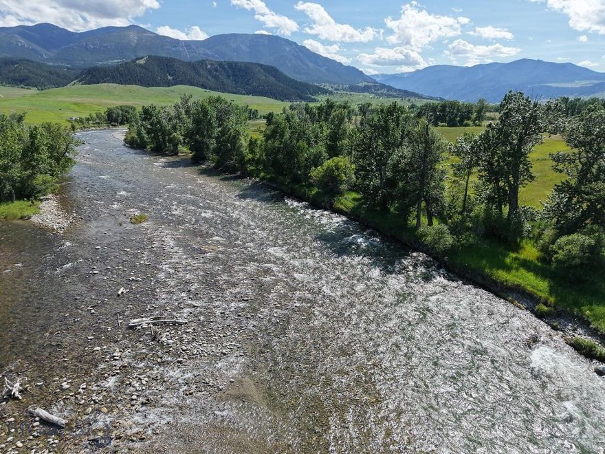 Nestled in the heart of Nye, Montana, Stillwater Legacy Ranch is a rare and remarkable offering that is rich in history and epitomizes the beauty and recreational abundance of the Stillwater Valley. Encompassing approximately 712± deeded acres, this property is framed by nature’s finest elements—rugged peaks, winding rivers, fertile meadows, and expansive nearby public lands. A true sanctuary for outdoor enthusiasts and nature lovers, the ranch is surrounded by the stunning Beartooth Mountains and Absaroka-Beartooth Wilderness. This untouched backcountry yields access to world-class hiking, fishing, hunting, and outdoor adventure, right from your back gate and beyond.
Stillwater Legacy Ranch boasts an extraordinary 1.65± miles of the Stillwater River frontage, complemented by 0.7± miles of both sides of the West Fork Stillwater River flowing through the middle of the property. In addition to these significant water features, the property hosts a network of spring creeks that offer outstanding potential for stream restoration and enhancement, creating both ecological value and fly-fishing opportunities. Adding to its rarity, these natural thermal springs that never freeze over flow year-round through the property, enhancing its appeal, utility, and natural wonder.
Originally homesteaded in 1896, this working ranch has been owned and operated by the same family for 129 years. It has earned distinction as a Montana Historical Ranch and is a treasured part of the state’s ranching heritage. 
Agriculturally, the ranch supports approximately 80± acres of flood-irrigated land planted in a productive creeping meadow foxtail and orchard grass mix, offering potential for hay production or livestock grazing. Improvements on the property include three modest homes, a barn, a garage, and four sheds—ideal for supporting an active agricultural lifestyle. 
Stillwater Legacy Ranch is ideally situated just 45± minutes from Columbus, 1± hour from the charming town of Red Lodge, and 1.5± hours from the commercial hub of Billings. Whether you’re seeking a private retreat, a working ranch, or a family legacy property, Stillwater Legacy Ranch offers unmatched natural beauty, abundant flowing waters, historic prestige, and remarkable privacy.