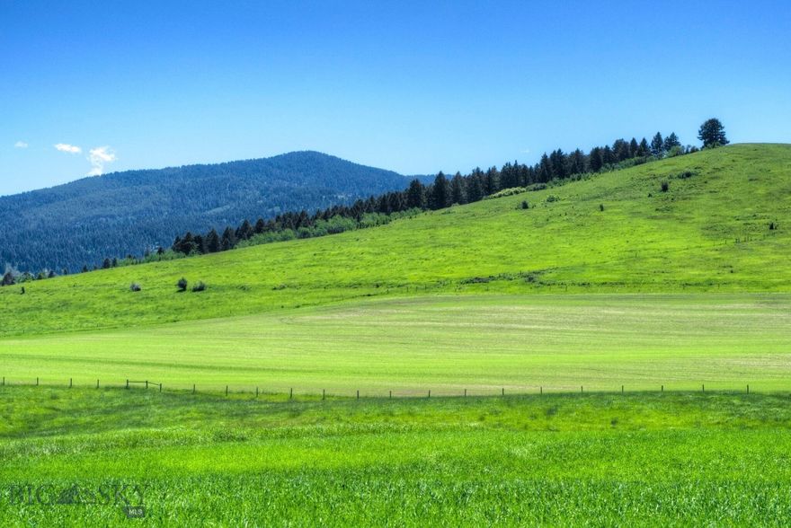 Welcome to Elk Mountain, an exceptional 80-acre parcel in the highest area of Misty Creek Ranch.  Enjoy breathtaking panoramic views of multiple mountain ranges, and immerse yourself in the beauty of the surrounding wildlife. This rare jewel of prime raw land is a natural habitat for elk herds and an historical calving sight. The 320 degree views present an abundance of scenic mountain ranges, offering the perfect canvas for your dreams to unfold. Only 20 minutes to downtown Bozeman, 30 minutes to the international airport, and 40 minutes to world-class Big Sky Resort. The convenient location and 360 degree scenery presents a canvas to paint the life you've always imagined. Elk Mountain is part of the 241 acre Misty Creek Ranch, also available for purchase, offering unparalleled beauty and boundless potential.