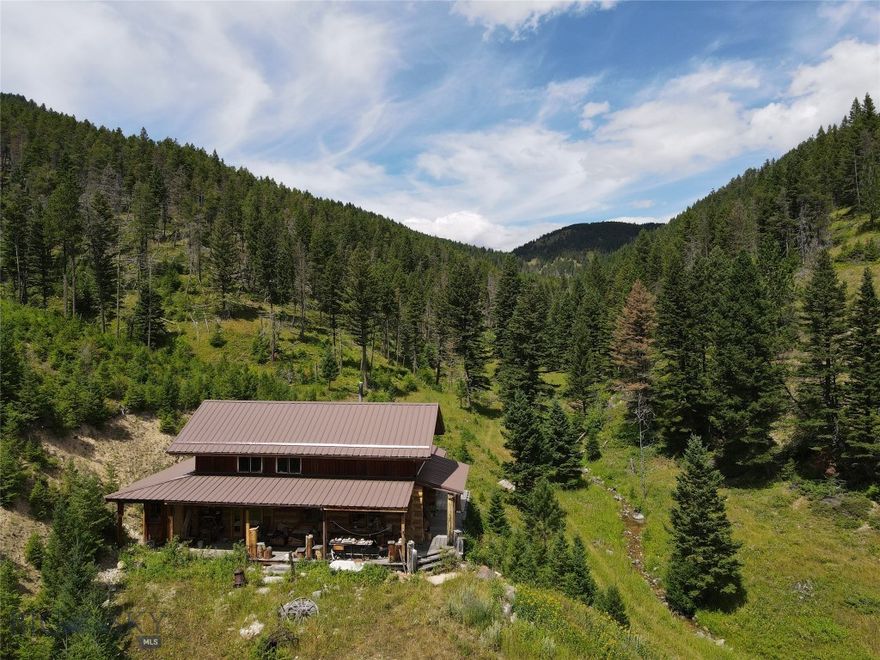 Hunters Paradise in Central Montana!  This 626 acre island parcel sits right in the middle of the Judith Mountains with nothing but BLM land surrounding it.  Grouse, deer, elk, mountain lions, and bears are just some of the wild game that call this area home.  Whiskey Creek meanders right through the property and even in August was still running strong.  The cabin was built in 1998 and has 1320 sq ft on the first floor with an additional 540 sq ft in an upstairs loft all on a concrete foundation.  If you are looking for private access to some of the best hunting Montana has to offer than look no further!  Possible owner financing available at a great rate as low as 5%. Call your realtor today for more details!  OPEN HOUSE 5/5 & 5/12 from NOON to 5:00 pm, Please RSVP!