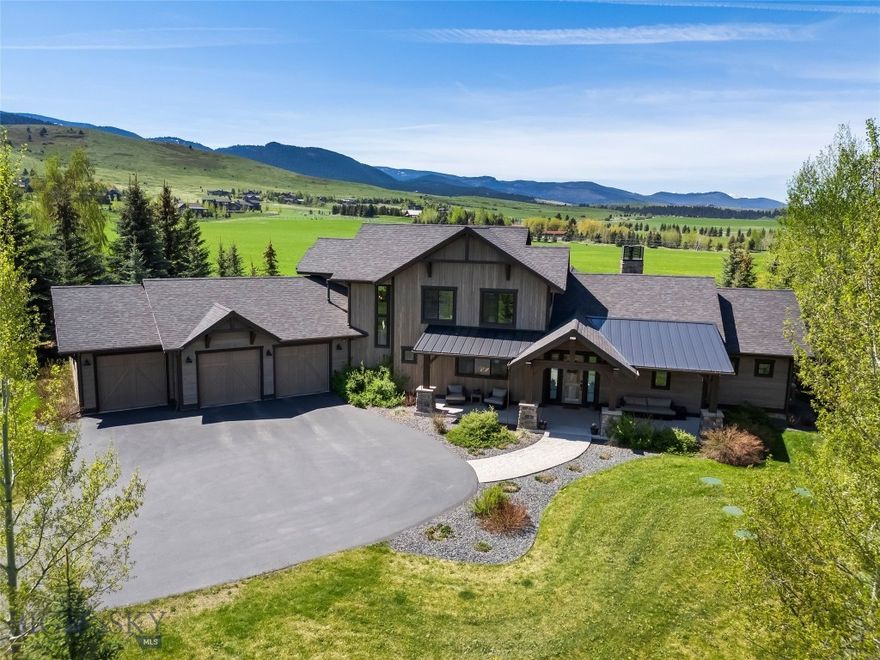 Located in the highly sought-after Greenhills Ranch subdivision, this custom home is sure to impress and lives much larger than expected with its vaulted ceilings and thoughtfully designed open floor plan. Situated on one of the premier view lots in Greenhills Ranch, the backyard perfectly frames the breathtaking Spanish Peaks and backs to a protected 100-acre conservation space that cannot be built on, offering exceptional privacy and permanently preserved views.

Set on over an acre of beautifully landscaped property, the home provides a peaceful retreat where quiet summer evenings can be spent enjoying stunning sunsets and abundant wildlife from the back patio. Reclaimed barn wood accent walls add warmth and character throughout multiple rooms, creating a refined blend of rustic Montana charm and modern comfort. The floor plan is both functional and inviting, featuring a spacious primary suite and a secondary en-suite bedroom on the main level. Upstairs, you’ll find a generously sized family room, two additional bedrooms connected by a Jack-and-Jill bathroom, and a dedicated office space.

With Hyalite Reservoir and endless year-round recreation just minutes from your doorstep, you’ll have quick access to hiking, boating, fishing, paddleboarding, camping, and some of the area’s most scenic trails. Whether you’re looking for adventure or a peaceful retreat, this property offers the best of Montana living in one of Bozeman’s premier communities.