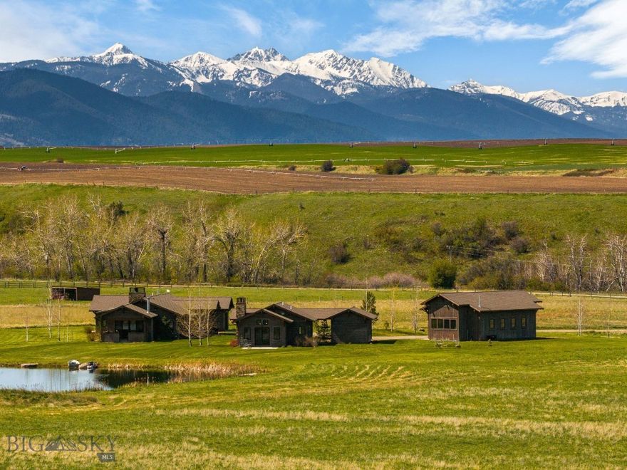 Welcome to 232 High Lonesome Trail located in the coveted Gallatin Valley just a few miles south of Bozeman. This beautiful premier custom home includes guest house quarters, a 2 Bay heated shop and a private trout pond. Positioned on 20 acres, it was built in 2020. It is a thoughtfully and meticulously maintained home that emanates its fine quality workmanship. Designed by renowned Architect BrechBuhler and longtime builder Chris Stewart, it is a true Montana legacy property, where rustic charm meets a modern contemporary refined mountain lifestyle with majestic mountain views. The main home ( 2,740+-) and guest quarters ( 996 +- sf) are elegant, private and in a comfortable quiet rural setting. From the warm and inviting entryway to the impressive stone fireplace, no details were missed on this custom mill-work masterpiece. Situated on plenty of acreage, it provides space for an equestrian enthusiast or just someone looking for elbow room and privacy in an unmatched location. The 360 degree panoramic mountain views provide a dramatic backdrop for sunrises and sunsets. With a stocked trout pond designed by Pond and Stream consulting, Alex Fox, you have a private oasis for fly fishing or swimming, a place to gather with family and cool off on a warm summer day. Escape the hustle and bustle with an outdoor fireplace patio just outside the great room where you can relax and admire the mountains while overlooking your private pond. Bozeman is located in the Greater Yellowstone Ecosystem, just north of Yellowstone Park by 60 miles as the crow flies, an area that provides world-class recreation, from camping, mountain biking, skiing and hiking to hunting, fishing and boating. This property comes with valuable water rights and plenty of room for equestrian pursuits, boutique farming, or simply enjoying wide-open Montana skies. With a location that feels worlds away, this rare property offers the best of Montana living. Located only a short drive from downtown Bozeman where you find Montana State University, medical services, fine restaurants, retail outlets and your shopping needs. It is also just 30 minutes from the Bozeman Yellowstone International Airport. If your are looking for your Montana home, this may be it.  Please reach out to schedule your private showing to experience this special space in person.