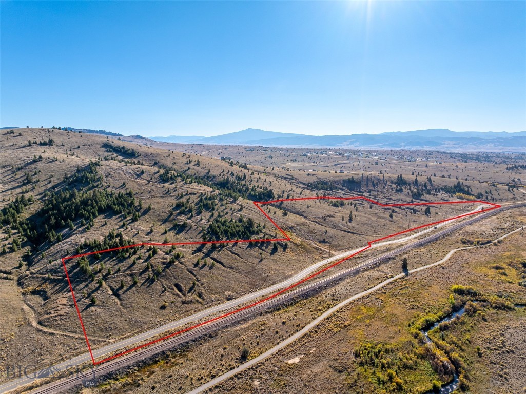 Vacant land 23.88 acres has two mining claims with mineral rights located on a slight hillside. Could be developed into a home site.