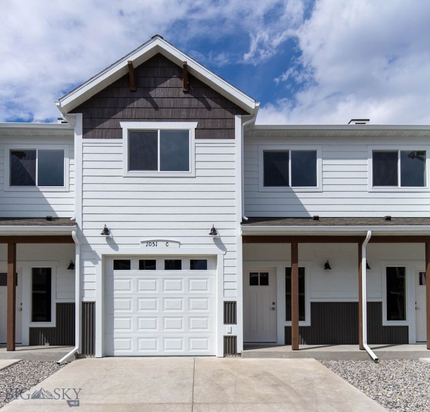 This beautiful new construction condo offers the perfect blend of modern living and convenience, just minutes from the new high school, local restaurants, recreation, shopping, and more. Featuring three spacious bedrooms and two and a half bathrooms, this home is designed for comfort and style. The bright, open kitchen is complete with a large pantry, sleek countertops, and stainless steel appliances. The open floor plan creates a seamless flow between the living room and dining area, both with access to the patio. Upstairs, you'll find all three bedrooms and the laundry area, including the primary suite with double vanities, a tiled shower, and a generous walk-in closet. A versatile bonus area on the second level offers additional space for a family room, home office, or other lifestyle needs. Quality finishes throughout plus a one-car attached garage. Photos are of a similar units, and finishes may vary.