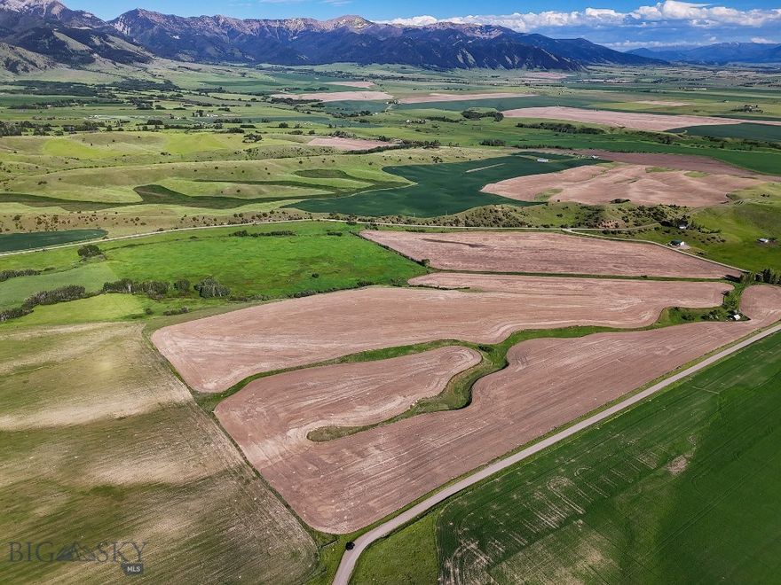 If you have been searching for a showcase property this is it! Pheasant Ridge delivers a captivating blend of natural beauty, live water, huge views, privacy, easy access and the opportunity to build your custom home, guest home and barn. This 59+ acres offers plenty of space and truly amazing views in virtually every direction, including Bridger Mountains and Ross Peak, the Gallatin Range & Valley, Hyalite and Spanish Peaks all the way to the Tobacco Roots from sunrise to sunset. The rolling topography develops an upper and lower section to the acreage creating separation for residential and agricultural uses. Bear Creek flows through the lower section of the property providing a nice year round stream with stock water rights. The acreage is also currently farmed and provides a small farm lease income. Electrical power and phone are to the lot just off Pheasant Ridge Rd with easy road access to an incredible build site. Enjoy the solitude this property offers while still being only 15 minutes to the airport and Belgrade and 20 minutes to downtown Bozeman.