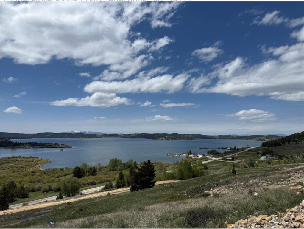 Welcome to your own slice of paradise! This stunning 2-acre lot at Georgetown Lake offers breathtaking lake views. New road made specifically for this subdivision. Well and septic approved. A 15,000 gallon fire protection water tank was put in. Power was brought up to the property. The covenants on this subdivision will allow for short-term rentals. With close proximity to everything you can imagine recreation-wise; lake and boat launch access, Discovery ski hill, nearby hiking trails, golfing at Old Works, ATV/snowmobiling trails, and fishing on one of the most renowned lakes. Discover the quaint towns of Phillipsburg and Anaconda close by. Don't miss out on this rare opportunity to build your dream home and embrace the beauty of Georgetown Lake!