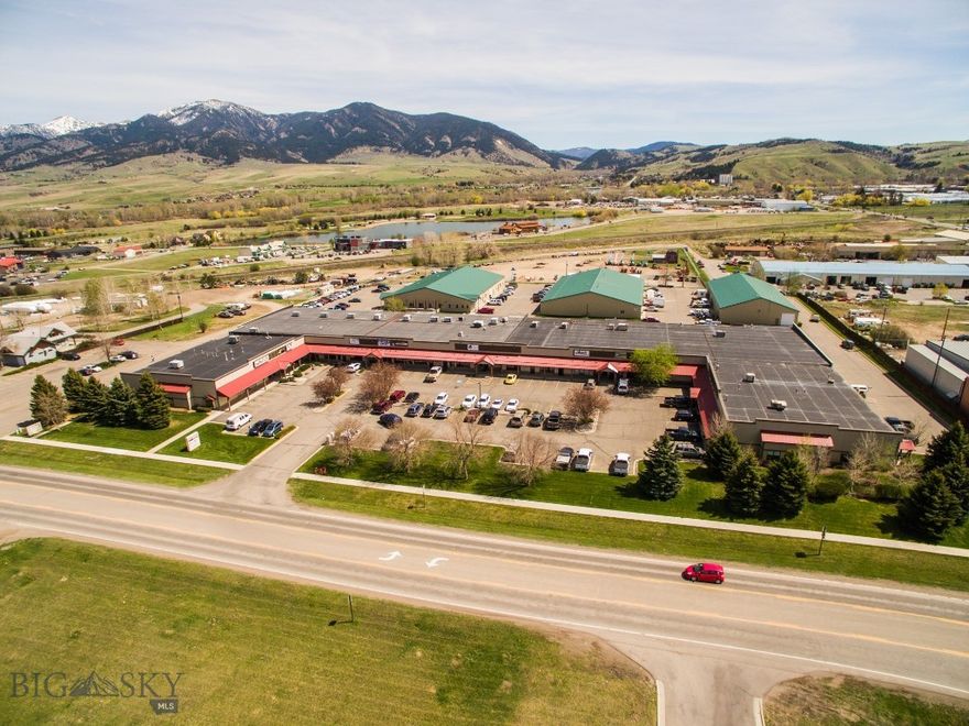Established industrial park on North 7th Ave. Complex consists of four buildings of over 100,000 sf.  Office or Retail space with store front door on south side, overhead door and two-man doors on north side of building.  Currently, consists of office, storage or shop space and a bathroom.  Space could be modified if needed.  Signage available on building and monument sign. Ceiling heights 14' to 16'.