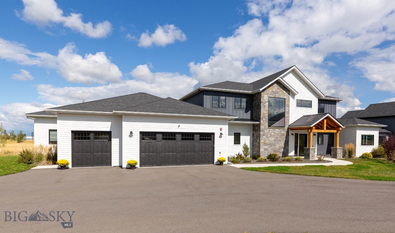 Welcome to this exceptional estate in the prestigious Home 40 Subdivision—Bozeman’s premier south side community, known for its sweeping mountain views, expansive open space, and unparalleled amenities. Situated on just over an acre, this 4,487 sq ft custom home offers timeless design, luxurious finishes, and functional elegance throughout.
Step inside to an open-concept floor plan that perfectly blends modern comfort with refined style. The heart of the home is a gourmet kitchen featuring top-of-the-line Thermador appliances, a custom island, walk-in pantry, and a stylish bar area—perfect for entertaining. Gather around the floor-to-ceiling fireplace in the great room, or open the doors to the covered patio and take in the unobstructed Bridger Mountain views.
The main-floor primary suite is a private retreat, complete with a spa-inspired bathroom, expansive walk-in closet, and its own dedicated patio where you can enjoy your morning coffee or evening sunsets. A separate main-floor guest bedroom and ¾ bathroom offer comfort and privacy, ideally located near a dedicated office with picturesque mountain views.
Upstairs, discover two versatile loft spaces, three spacious bedrooms—one with a private ensuite—and an additional full bathroom, offering flexible living and hosting options.
Additional features include a heated 3-car garage with abundant storage, central A/C, a fire suppression system, whole-house water softener, and a state-of-the-art security system. Enjoy luxury living year-round with access to Home 40’s exclusive community amenities: a fully equipped fitness center, outdoor pool, scenic trails, tranquil pond, and over 40 acres of preserved open space. Nestled in the heart of the Gallatin Valley, this exquisite residence offers easy access to Hyalite Reservoir, Montana State University, downtown Bozeman, and world-class skiing at Big Sky and Bridger Bowl.
Don’t miss this rare opportunity to own a remarkable home in one of Bozeman’s most sought-after neighborhoods—where luxury, lifestyle, and location converge.