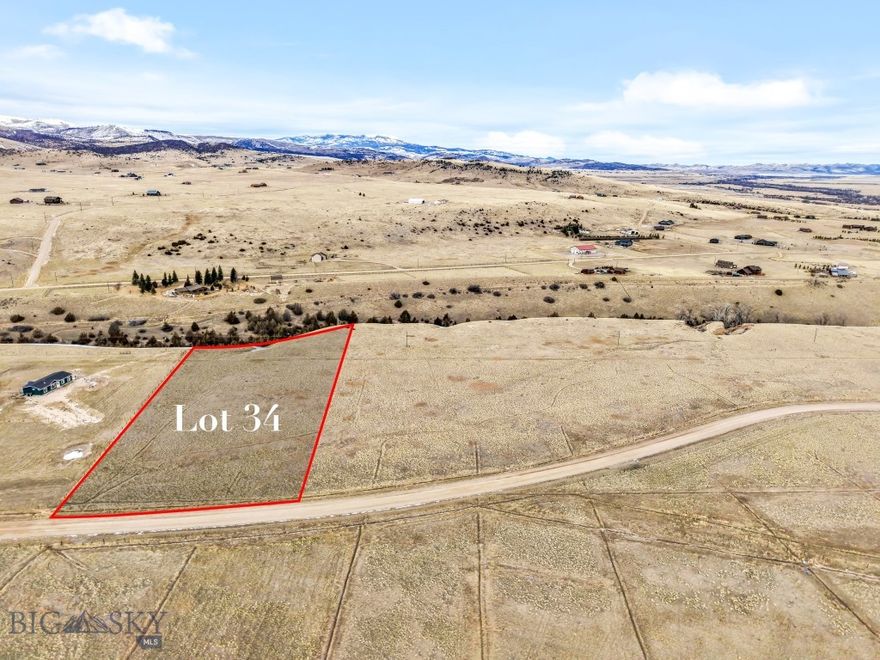 One of three 5+ acre parcels overlooking Blaine Spring Creek. Many building locations & room for a shop, barn, etc. Irrigation water available with paid annual water dues of $75/lot. Annual HOA dues are $200/lot. The HOA has a $2500 fee to build which goes into road maintenance. Power runs across the lot so hookup should be reasonable. Owners have access to the private stocked Haypress Lakes. Just a short drive to the Varney Fishing access, public land & Axolotl Lakes. Photos are across & of all 3 lots. Also available are MLS 401266 & MLS 401267.