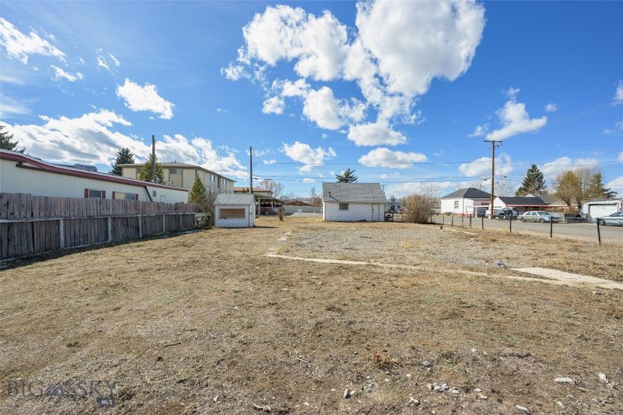 LOCATION LOCATION! Located in an unbeatable spot just off Harrison Ave in Butte, this lot is full of potential! Whether you're looking for a prime investment opportunity or the perfect place to build, this property has a solid head start. A two-car garage and a shed are already in place, giving you extra storage or workspace while you plan your next move. With convenient access to shopping, dining, and all that Butte has to offer, this lot is ready for your vision. Don’t miss out on this rare chance to build in such a great location! Property rated for light industrial.