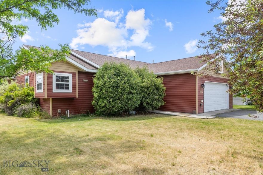 Looking for a well-maintained single-family house under $500,000? This is it! It also features air conditioning and an extensive yard with potential for RV parking. This charming 3-bedroom, 2-bathroom home offers easy single-level living and modern comfort, with a desirable open floor plan with vaulted ceilings in the living area.
Thoughtful updates over the years include newer appliances, lighting fixtures, faucets, toilets, and fresh paint, making it feel current and truly move-in ready. (Be sure to ask for the full list of upgrades!)
Step outside to enjoy the expansive deck, perfect for outdoor dining and BBQs, plus a cozy firepit area ideal for Montana's evenings. The expansive yard features underground sprinklers, a convenient storage shed, and mature lilac bushes that add both beauty and privacy. Additional alley parking adds flexibility for guests, extra vehicles, or an RV.
Enjoy stunning mountain views from the front of the home, complemented by the rhythmic, nostalgic sound of passing trains. Situated just one block from a large neighborhood park. This ideal location offers quick access to the Airport and Bozeman, making it a prime location for both convenience and lifestyle. Come see it and settle in just in time for summer fun!