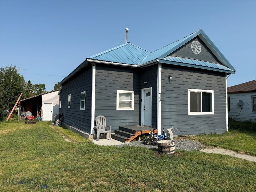 This residential residence features a spacious main level, complete with a cozy living room, a bright dining area, and a functional kitchen that offers plenty of potential for your personal touch. You will find two comfortable bedrooms, a well-appointed bathroom, and a laundry room in close proximity to make life convenient. The upper level has an open bedroom with a 3/4 bathroom that awaits completion. This is a versatile space for hobbies or a guest area. While this interior boasts unfinished updating projects, it provides a fantastic opportunity to customize and create your dream living space. The exterior of the home features attractive siding and a new metal roof to add to its curb appeal. Enjoy the private fenced yard and the spacious 44x24 shop, which offers ample room for parking, storage, and projects. This home is a canvas awaiting your vision-take the first step towards making it yours today!