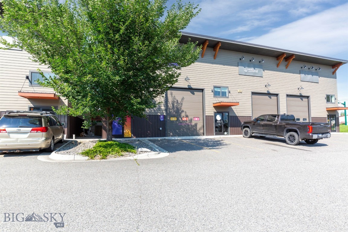 Prime shop/office hybrid just off North 7th with swift I-90 access. The property features an approx. 17' × 80' shop/warehouse served by a 10'×14' overhead door, plus a quality office build-out with reception, multiple private offices, a 3/4 bath, kitchenette, laundry, and a dedicated workshop area. Separate heating for the office and shop zones. Move-in ready for contractors, service businesses, or an exceptional private gear/garage space. This is a thriving commercial park, many uses allowed, but some prohibited, contact agent for details.