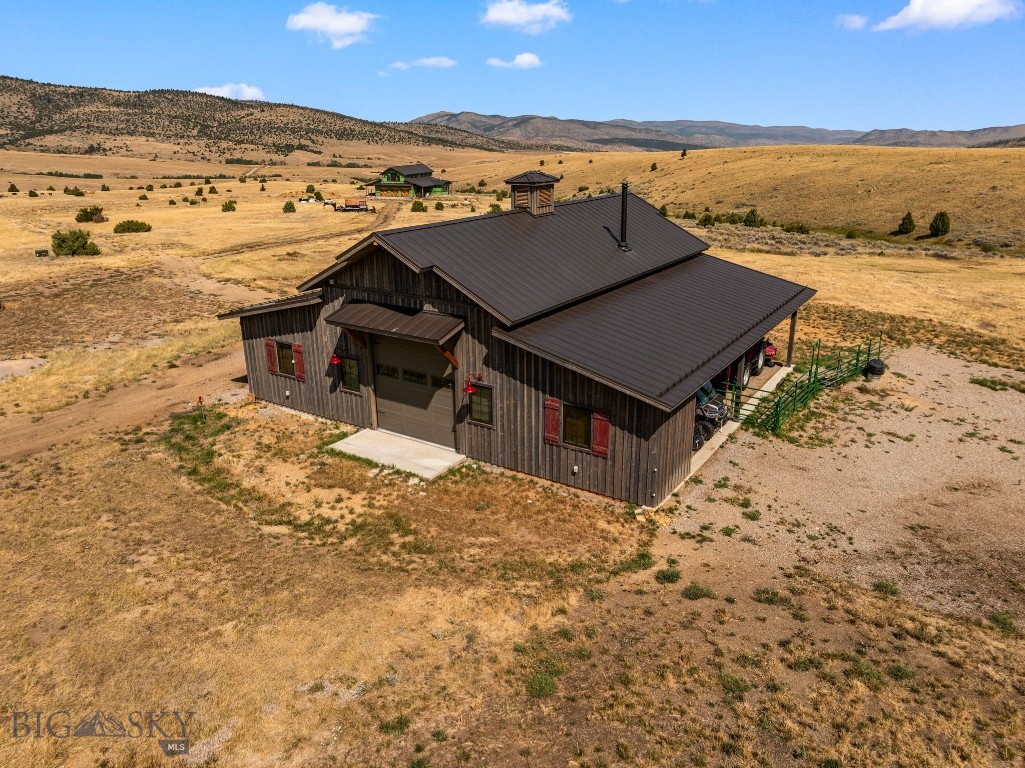 80 Gorgeous Acres, fully finished drive through shop, 60gpm well, Antelope Creek with water rights, AND a custom home to finish, RIGHT OUTSIDE PONY!! Enjoy the good life outside Pony Mt on your own 80 acres, with immediate access to all the Tobacco Root Mtns have to offer. The shop is perfect to live in while you finish out this masterpiece to fit your taste. It has a fully finished interior, 3/4 bath, two heat sources, its own septic and buried propane, Full RV hookups, even a backup generator!
The 5br+- custom home is dried in, rough in plumbed (3 full bath), HVAC installed, has custom 8' Alder interior doors pre-finished and on site, Custom Alder windows, and even and elevator! The floor plan can be adjusted to suit at this point, with the majority of both floors having full span joists/trusses. This is a once in a lifetime opportunity, when was the last time you saw 80 acres near Pony for sale? Let alone with a shop and custom home! Back on the market after buyers couldn't get the financing done, don't miss out this time, this place is what dreams are made of!