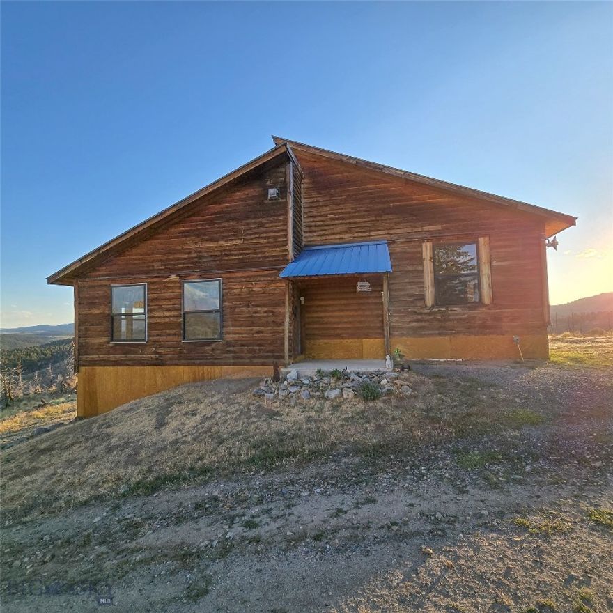 Serene Mountain Retreat on 20 Acres with Stunning 360° Views
Escape to your own private oasis at 210 Friend Spring Rd, Whitehall, MT! Nestled in the heart of Montana’s breathtaking Highland mountains, this unique 2-bedroom, 1-bathroom home sits on 20 sprawling acres, offering unparalleled tranquility and panoramic 360° views of the Highlands and the Tobacco Roots. Perfect for those seeking a peaceful retreat or an off-grid lifestyle, this property combines rustic charm with modern potential. This gem boasts a thoughtfully designed layout with a spacious main-floor master bedroom and bathroom, plus a versatile upper-floor loft bedroom, ideal for guests, an office, or a cozy hideaway.

20 Acres of Serenity - Expansive lot with endless possibilities for outdoor recreation, or future expansion, all surrounded by Montana’s stunning natural beauty.

Eco-friendly solar power system, with grid power available at the lot for flexible energy options.

A Convenient and spacious garage lies below the home, perfect for vehicles, storage, or a workshop. It also houses the heart of the utility system with its solar inverter and battery system, along with a well pump and water holding tank to supply the home. The garage space also has an additional room to store food supplies or whatever the new owner desires. 

A functional main-floor kitchen is ready for your personal touch to create the heart of the home. An on-demand hot water system provides ample warm water for additional guests or high demand situations.

Home is wrapped and ready for siding of the buyer’s choice, offering a unique opportunity to personalize the look of your mountain retreat (two sides of siding needed).

Mule deer, elk and black bears frequent the area, so be sure to keep your spotting scope by the front window and observe nature's beauty!  

This one-of-a-kind property offers the best of Montana living—peaceful seclusion, jaw-dropping mountain views, and proximity to Butte, MT, Whitehall, MT, and hunting areas galore. Whether you’re dreaming of a year-round residence, a vacation getaway, or an off-grid adventure, this home is a blank canvas awaiting your vision. The open loft space upstairs provides flexibility, while the mountain location ensures ultimate privacy and serenity. Don’t miss this rare opportunity—contact us today to schedule a viewing!