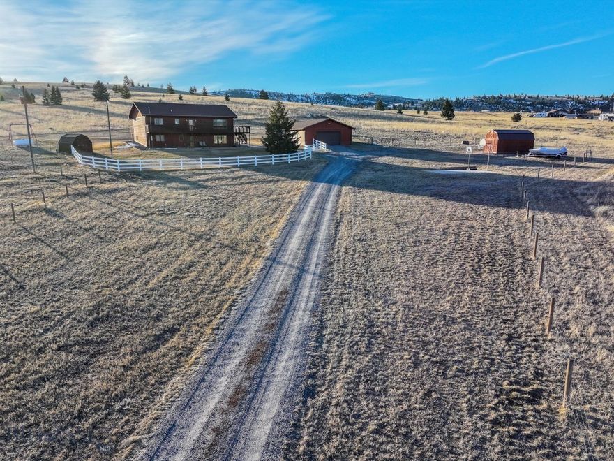 Welcome to your dream Montana retreat! This well-maintained 4-bedroom, 3-bath home offers room to roam, relax, and enjoy true Big Sky Country living—all just 15 minutes from both Butte and Anaconda. Situated on 40 acres with no covenants, the possibilities are endless.

The home features an inviting and functional layout with four spacious bedrooms plus a versatile bonus room—perfect for a home office, den, or a fifth bedroom. Enjoy sweeping mountain and valley views from the deck, and cozy evenings in the warm and welcoming interior.

Outside, you’ll find a detached 4-car garage, ideal for storing vehicles, equipment, or setting up a workshop. The property can be subdivided, making it a fantastic investment opportunity for future development or multi-generational living.

Whether you're looking for privacy, convenience, or the chance to create your own Montana legacy, this property has it all.