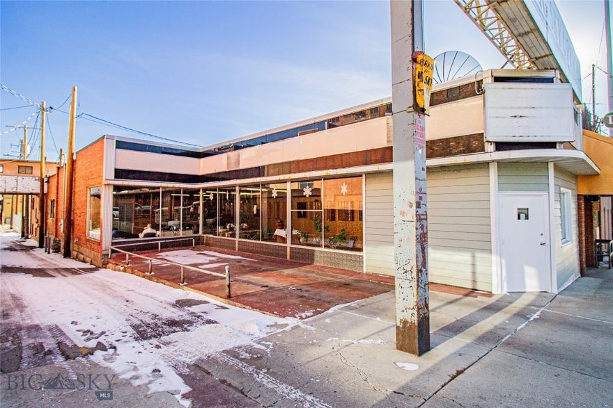 LOCATED IN THE BUTTE OPPORTUNITY ZONE! Discover a versatile 4,150 sq. ft. commercial building in the heart of Uptown Butte, currently home to Big Sky Optical. This well-maintained space offers flexibility for a wide range of uses- including office, retail, bar, or restaurant—making it an excellent opportunity for both investors and business owners.
Positioned along a high-traffic corridor, the property provides outstanding visibility and easy access for customers. Whether you're looking to expand an existing business or develop a new concept in one of Butte’s most active commercial districts, this location delivers exceptional potential.