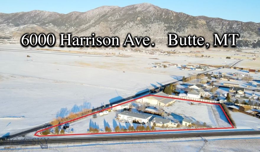 Potential, Potential, Boasts this outstanding Commercial Property! Located on Harrison Avenue in Butte, Montana. Originally built as a restaurant in 1975.  The most recent use in the past several years has been the home of a Veterinary Clinic. Offering a 3,208 Commercial building with numerous rooms and 3 bathrooms and all plumbing necessary for an Animal Clinic, a fabulous huge indoor riding arena with horse and animal stalls and storage for equestrian equipment, A large shop with garage area with bathroom and 2 bedrooms, 2 Hay Barns with the indoor hay barn having horse stalls and an also featuring an outdoor riding arena. The possibilities are endless, a veterinary clinic, a horse training school, an event center with restaurant are just a few possibilities for this amazing property. Zoned C2 and Sits on 3.370 Acres!