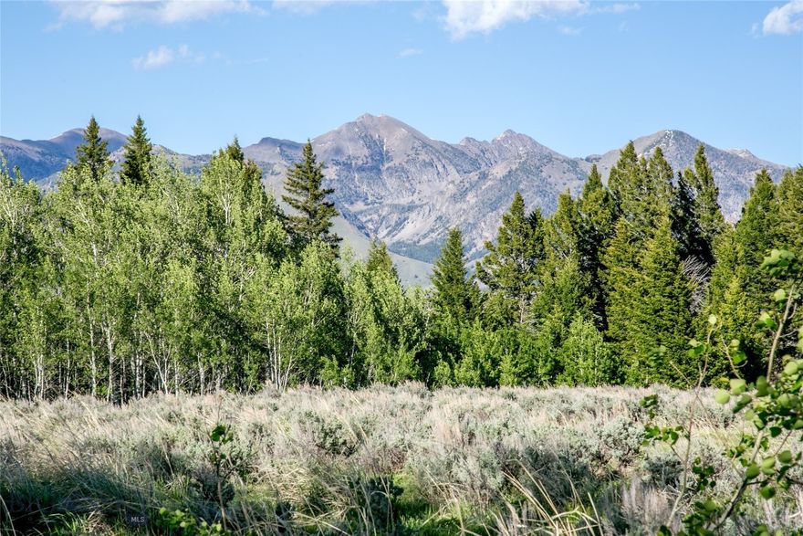 At 8.719 acres, this is one of the larger lots on the ranch and features a large aspen grove and mature Douglas Fir trees on a ridge with filtered Madison Range views to the west. Views to the East are spectacular mountain meadows and Gravelly Mountain Range. This expansive lot borders ranch open space where there is treed gully and lots of game trails. This lot allows a single story home with up to a 50% square foot lower level. Experience Montana at it's best on this alpine property just south of Ennis. Ownership in Sun West Ranch includes access to three miles of the Madison River and stocked spring fed ponds, horse back riding on trails throughout the ranch and much more. The ranch is less than half an hour to Yellowstone National Park. The ranch provides great access to public lands on its southern and SW boundaries and you will see lots of wildlife. Ranch management keeps an eye on your property, the roads plowed in the winter, maintained in the summer and manages the 2000 acres and 1600 acres of open space that the 55 homeowners share.