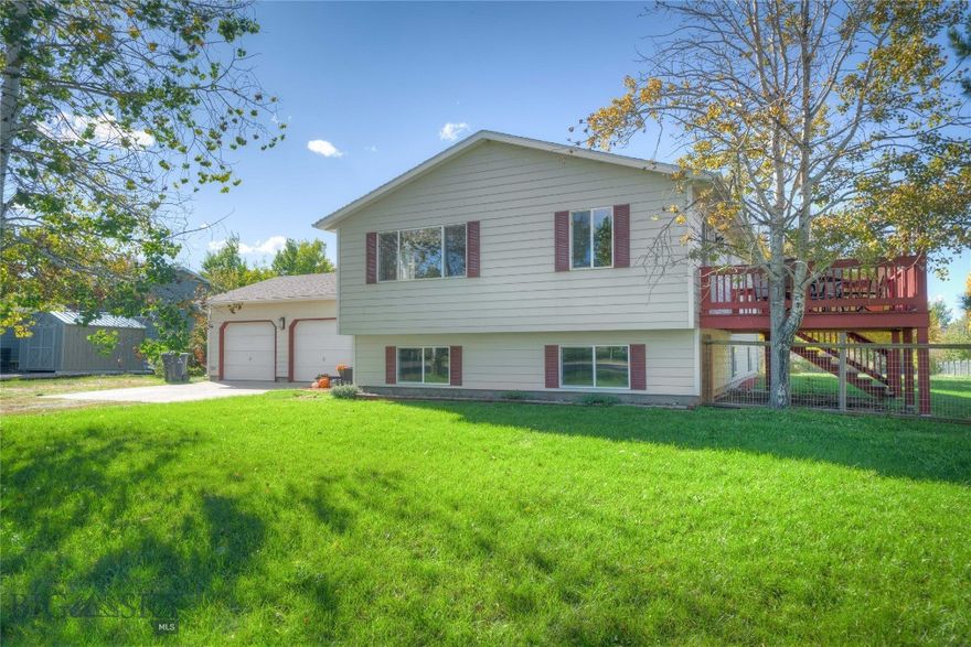 Set on a quiet, end-of-road location, this spacious custom home offers the perfect blend of comfort, versatility, and convenience. The park-like ½+ acre lot features mature landscaping and peaceful surroundings.
Inside, you'll find vaulted ceilings, beautiful hardwood flooring and an updated kitchen. Skylights bring natural light into the bathrooms, while unusually oversized bedrooms and walk-in closets provide generous space for family members or co-living. The versatile daylight level includes a large flex area ideal for a media or family room, plus a fourth bedroom (without closet) that works equally well as a large office, gym, or hobby room. Audiophiles will appreciate the wiring for sound in living areas and primary bedroom.
Enjoy outdoor living on the deck off the dining area and take advantage of the extra gravel pad with 30-amp power—perfect for RV or trailer parking. The oversized garage adds even more storage and functionality.
The neighborhood features a local park with pavilion and playground, as well as a community park with large pond and walking trails. All just minutes from both Bozeman and Belgrade with easy access to I-90 and the airport. This home truly combines relaxed neighborhood charm with central convenience.