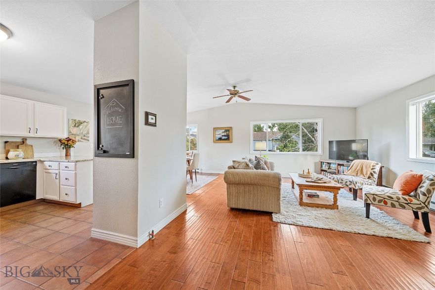 Set on a quiet, end-of-road location, this spacious custom home offers the perfect blend of comfort, versatility, and convenience. The park-like ½+ acre lot features mature landscaping and peaceful surroundings.

Inside, you'll find vaulted ceilings, beautiful hardwood flooring and an updated kitchen. Skylights bring natural light into the bathrooms, while unusually oversized bedrooms and walk-in closets provide generous space for family members or co-living. The versatile daylight level includes a large flex area ideal for a media or family room, plus a fourth bedroom (without closet) that works equally well as a large office, gym, or hobby room. Audiophiles will appreciate the wiring for sound in living areas and primary bedroom.

Enjoy outdoor living on the deck off the dining area and take advantage of the extra gravel pad with 30-amp power—perfect for RV or trailer parking. The oversized garage adds even more storage and functionality.

The neighborhood features a local park with pavilion and playground, as well as a community park with large pond and walking trails. All just minutes from both Bozeman and Belgrade with easy access to I-90 and the airport. This home truly combines relaxed neighborhood charm with central convenience.