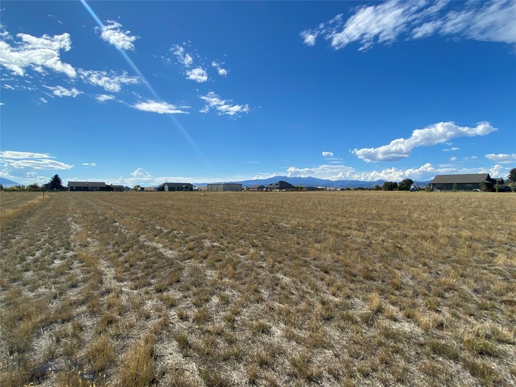 Enjoy breathtaking 360-degree views of the mountains from this ~1.15-acre parcel, perfect for building your dream home. The lot is situated on N Centurion, offering privacy and tranquility. For aviation enthusiasts, there is ample space to construct a hangar, with an airstrip ready for your plane in the backyard. This is a fantastic opportunity!