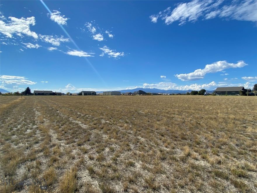 Enjoy breathtaking 360-degree views of the mountains from this ~1.15-acre parcel, perfect for building your dream home. The lot is situated on N Centurion, offering privacy and tranquility. For aviation enthusiasts, there is ample space to construct a hangar, with an airstrip ready for your plane in the backyard. This is a fantastic opportunity!
