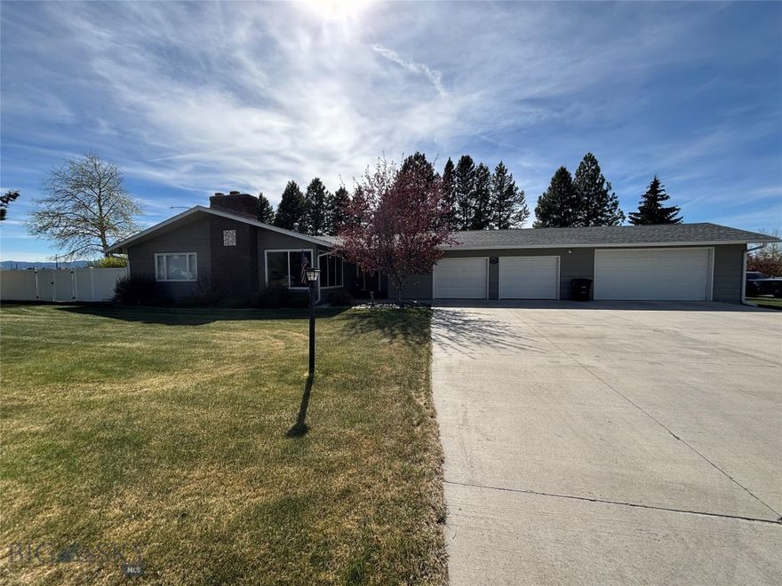 Located in a highly desirable area near the Butte Country Club golf course, this over 2,900 square foot home offers convenience, space, and exceptional amenities with easy access to Harrison Avenue, Continental Drive, and the interstate. Situated on just over a 14,000 square foot lot, this sprawling property boasts 4 bedrooms, 3 bathrooms, a beautifully renovated kitchen, updated bathrooms, and a large living room complete with fire place. 
The dining room makes a statement with a stunning oversized elk antler chandelier, adding warmth and Montana character to the space. The oversized garage offers room for up to six vehicles, recreational toys, or the potential for a workshop conversion. Downstairs, the basement bathroom includes a sauna, creating the perfect place to unwind and relax.
Designed with entertaining in mind, the backyard features a beautiful deck, spacious patio area, and a large yard ready to enjoy throughout the seasons.